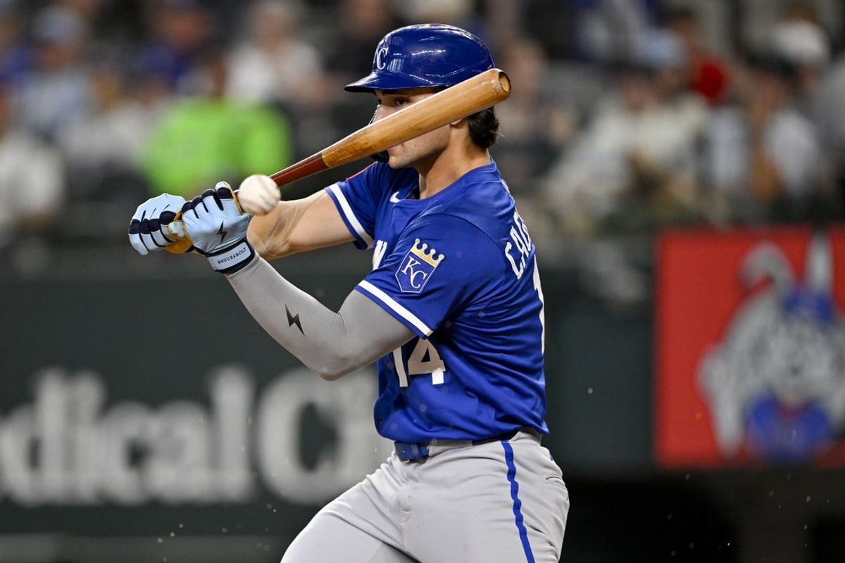Jun 19, 2025; Arlington, Texas, USA; Kansas City Royals right fielder Jac Caglianone (14) hits the ball with a check swing for an out against the Texas Rangers during the fourth inning at Globe Life Field. Mandatory Credit: Jerome Miron-Imagn Images