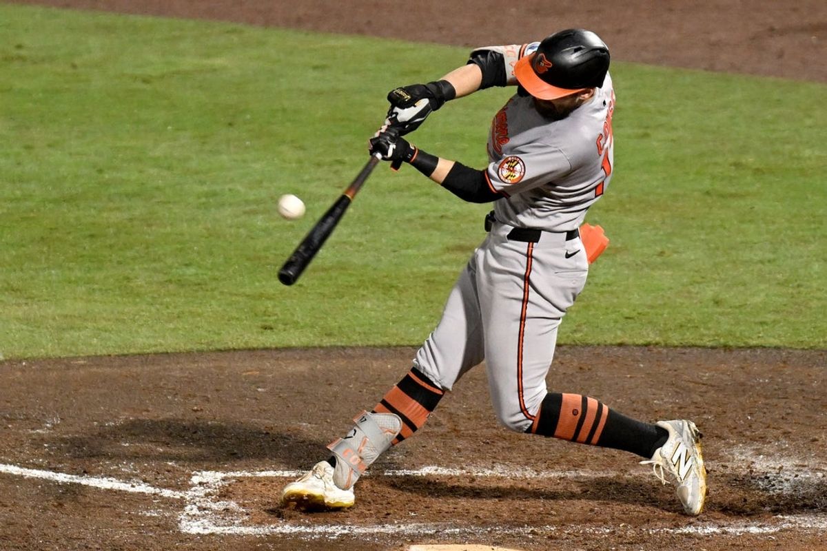 Jun 19, 2025; St. Petersburg, Florida, USA; Baltimore Orioles left fielder Colton Cowser (17) hits a three run home run in the sixth inning against the Tampa Bay Rays  at George M. Steinbrenner Field. Mandatory Credit: Jonathan Dyer-Imagn Images