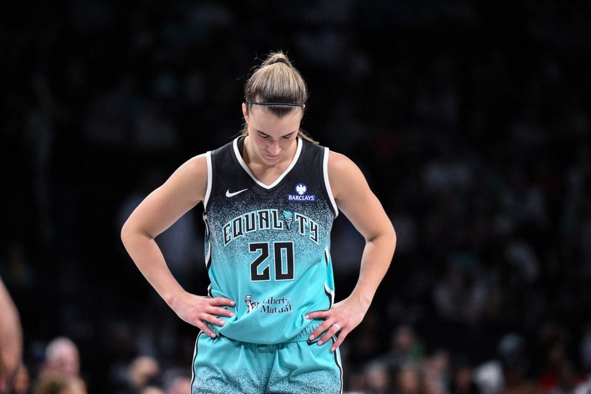 Jun 19, 2025; Brooklyn, New York, USA; New York Liberty guard Sabrina Ionescu (20) reacts during the second half against the Phoenix Mercury at Barclays Center. Mandatory Credit: John Jones-Imagn Images