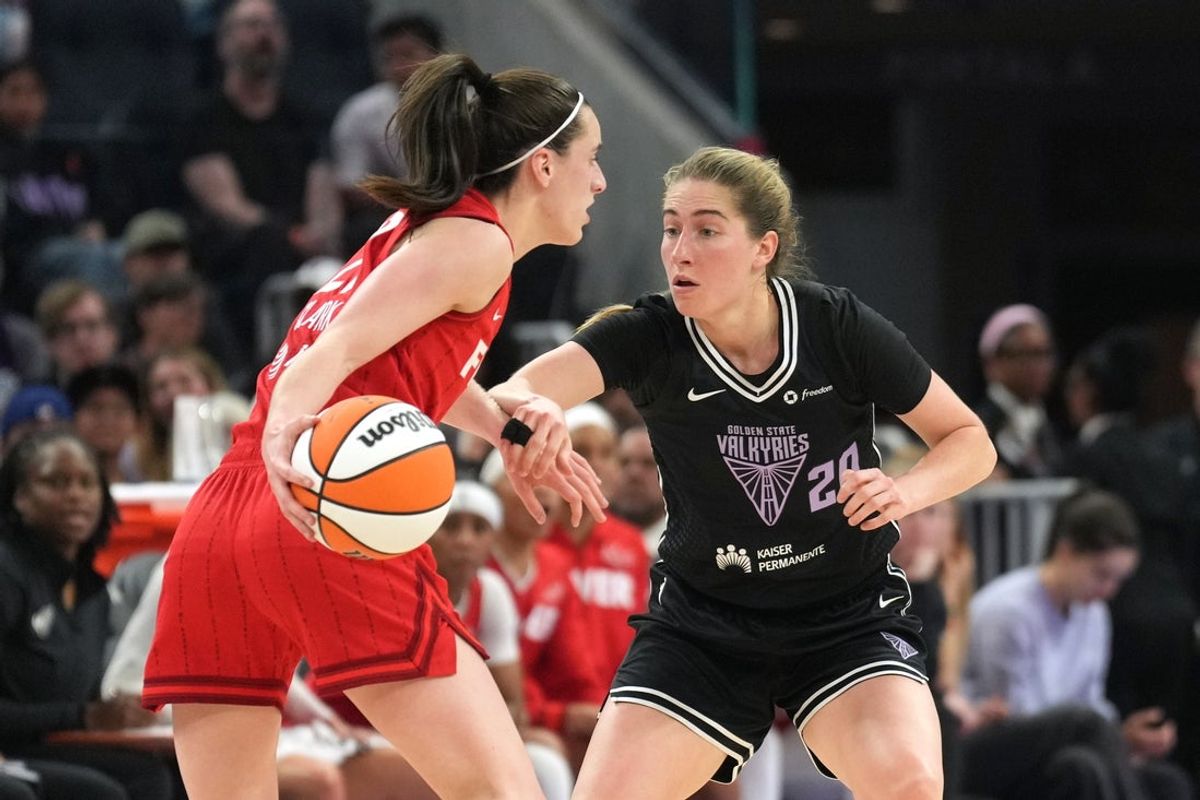 Jun 19, 2025; San Francisco, California, USA; Golden State Valkyries guard Kate Martin (20) defends against Indiana Fever guard Caitlin Clark (left) during the second quarter at Chase Center. Mandatory Credit: Darren Yamashita-Imagn Images