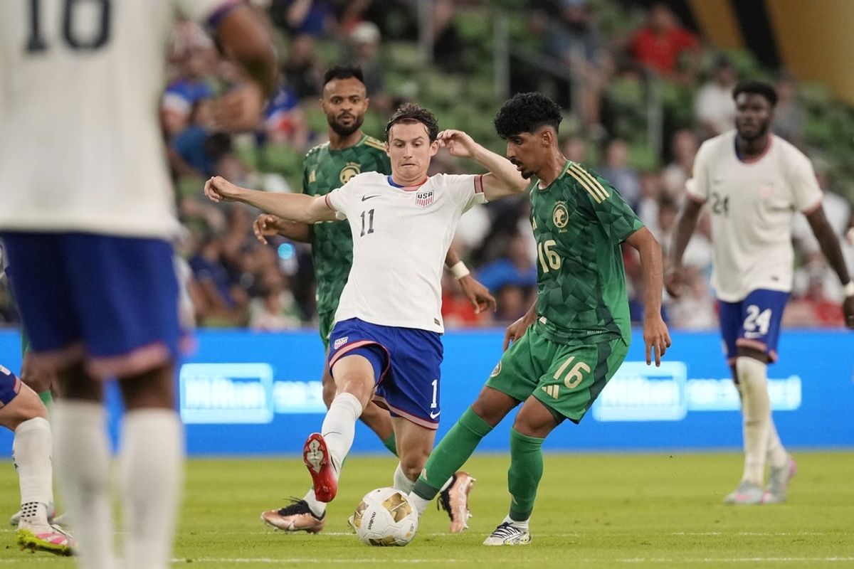 Jun 19, 2025; Austin, Texas, USA; United States of America midfielder Brenden Aaronson (11) and Saudi Arabia midfielder Ziyad Aljohani (16) battle for the ball in the second half during a group stage match of the 2025 Gold Cup at Q2 Stadium. Mandatory Credit: Scott Wachter-Imagn Images