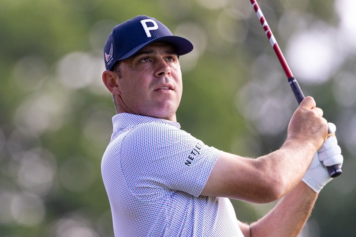 Jun 20, 2025; Cromwell, Connecticut, USA; Gary Woodland plays his shot from the first tee during the second round of the Travelers Championship golf tournament. Mandatory Credit: Bill Streicher-Imagn Images