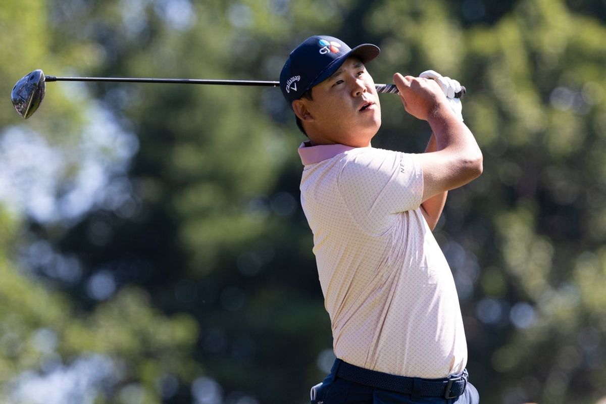 Jun 20, 2025; Cromwell, Connecticut, USA; Si Woo Kim plays his shot from the first tee during the second round of the Travelers Championship golf tournament. Mandatory Credit: Bill Streicher-Imagn Images