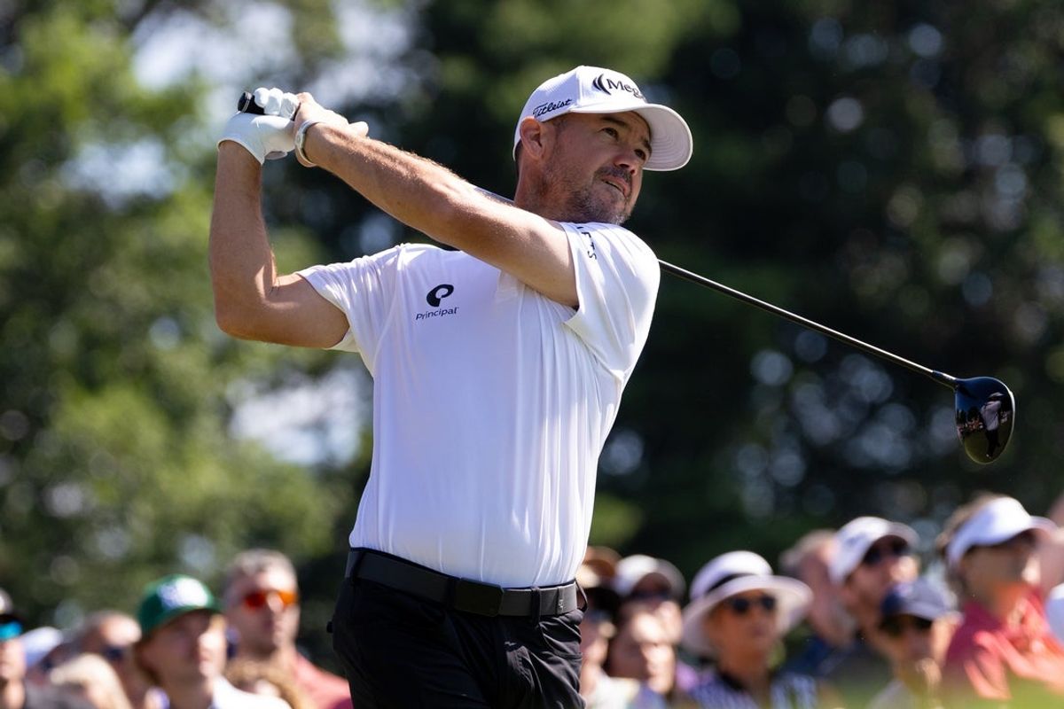 Jun 20, 2025; Cromwell, Connecticut, USA; Brian Harman plays his shot from the first tee during the second round of the Travelers Championship golf tournament. Mandatory Credit: Bill Streicher-Imagn Images