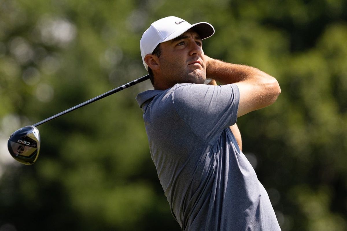 Jun 20, 2025; Cromwell, Connecticut, USA; Scottie Scheffler plays his shot from the first tee during the second round of the Travelers Championship golf tournament. Mandatory Credit: Bill Streicher-Imagn Images