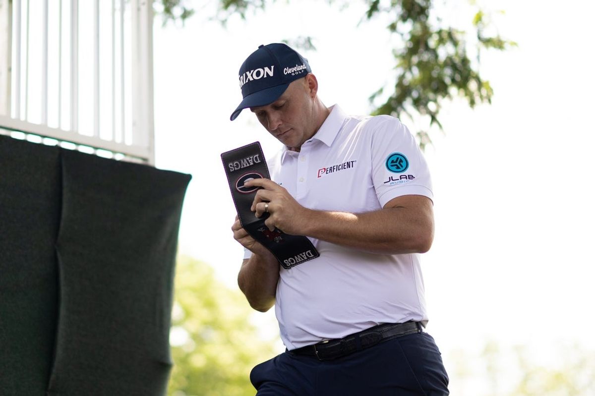 Sepp Straka (file photo) checks his score card as he walks off the eighth green during the second round of the Travelers Championship golf tournament. Mandatory Credit: Bill Streicher-Imagn Images