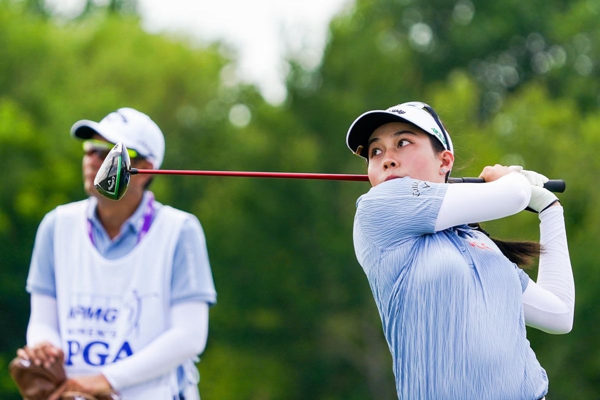 Jun 20, 2025; Frisco, Texas, USA; Jeeno Thitikul plays her shot from the 12th tee during the second round of the KPMG Women's PGA Championship. Mandatory Credit: Raymond Carlin III-Imagn Images