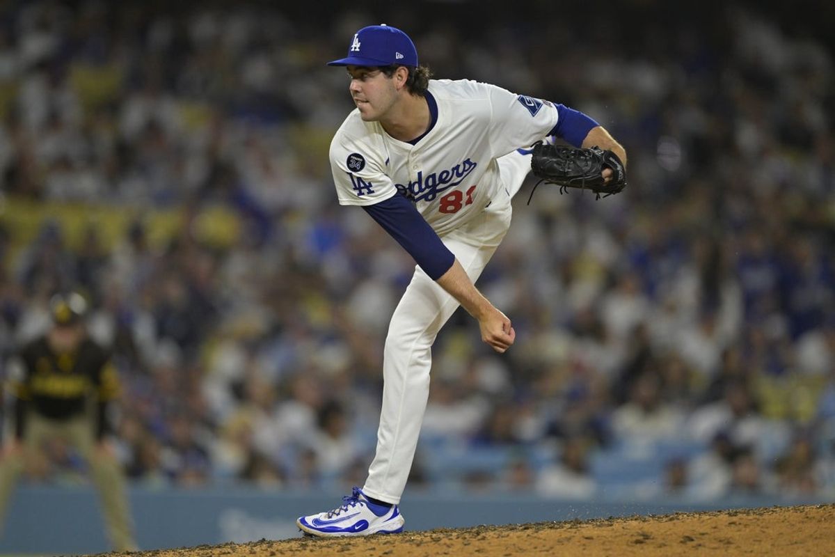 Jun 19, 2025; Los Angeles, California, USA;   Los Angeles Dodgers relief pitcher Jack Little (81) makes his major league debut in the eighth inning against the San Diego Padres at Dodger Stadium. Mandatory Credit: Jayne Kamin-Oncea-Imagn Images