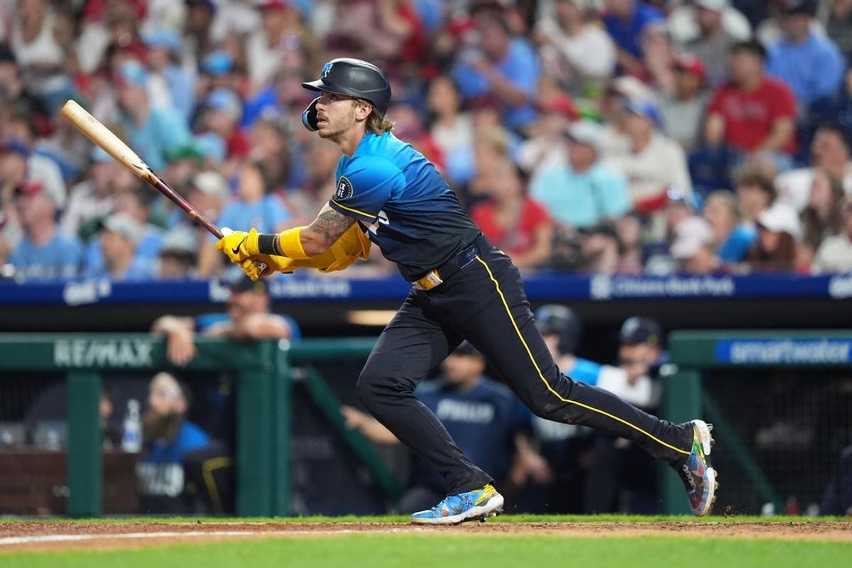 Jun 20, 2025; Philadelphia, Pennsylvania, USA; Philadelphia Phillies infielder Bryson Stott (5) hits an RBI double against the New York Mets in the seventh inning at Citizens Bank Park. Mandatory Credit: Kyle Ross-Imagn Images