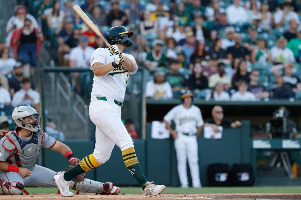 Jun 20, 2025; West Sacramento, California, USA; Athletics first baseman Nick Kurtz (16) hits a two run home run during the first inning against the Cleveland Guardians at Sutter Health Park. Mandatory Credit: Sergio Estrada-Imagn Images
