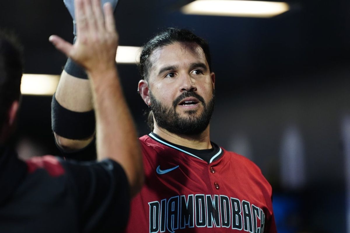 Jun 20, 2025; Denver, Colorado, USA; Arizona Diamondbacks third baseman Eugenio Suarez (28) celebrates his two run home run in the sixth inning against the Colorado Rockies at Coors Field. Mandatory Credit: Ron Chenoy-Imagn Images