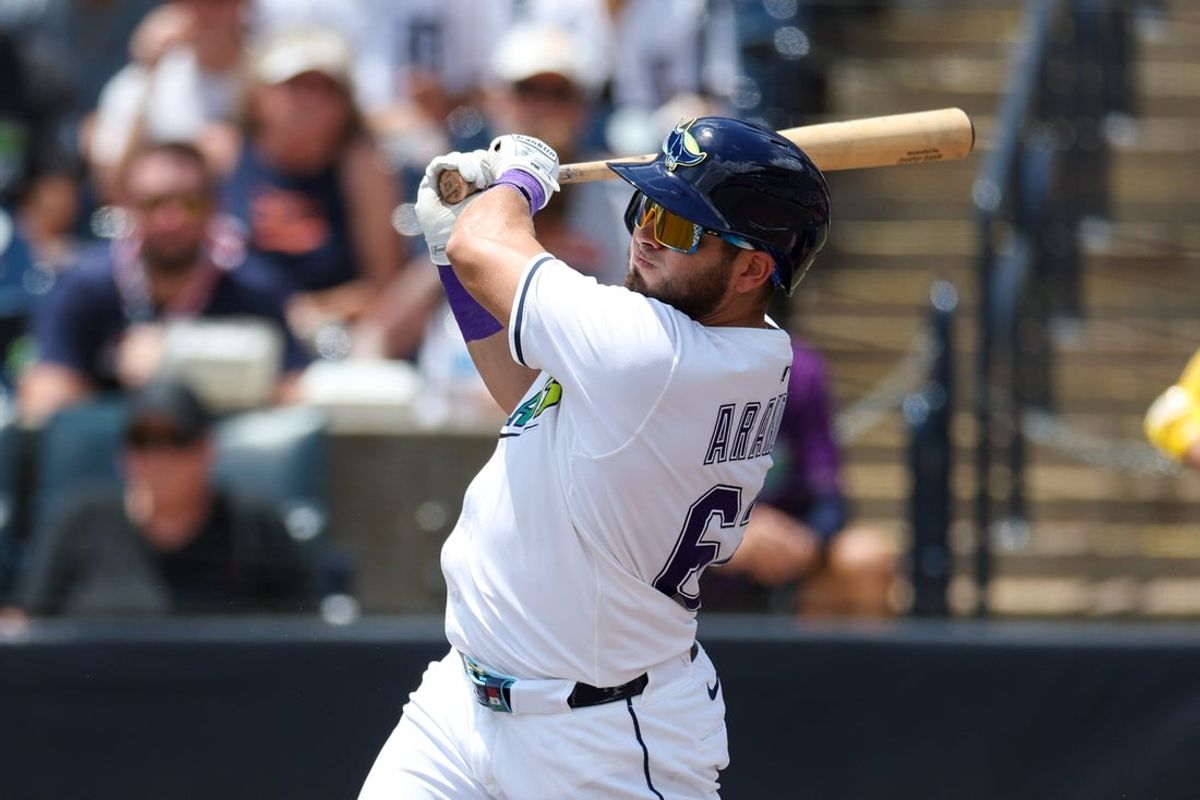 Jun 21, 2025; Tampa, Florida, USA; Tampa Bay Rays first baseman Jonathan Aranda (62) doubles against the Detroit Tigers in the first inning at George M. Steinbrenner Field. Mandatory Credit: Nathan Ray Seebeck-Imagn Images