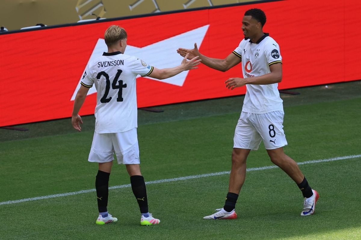 Jun 21, 2025; Cincinnati, Ohio, USA; Borussia Dortmund midfielder Felix Nmecha (8) and defender Daniel Svensson (24) react after a goal against Mamelodi Sundowns FC  during a group stage match of the 2025 FIFA Club World Cup at TQL Stadium. Mandatory Credit: Katie Stratman-Imagn Images