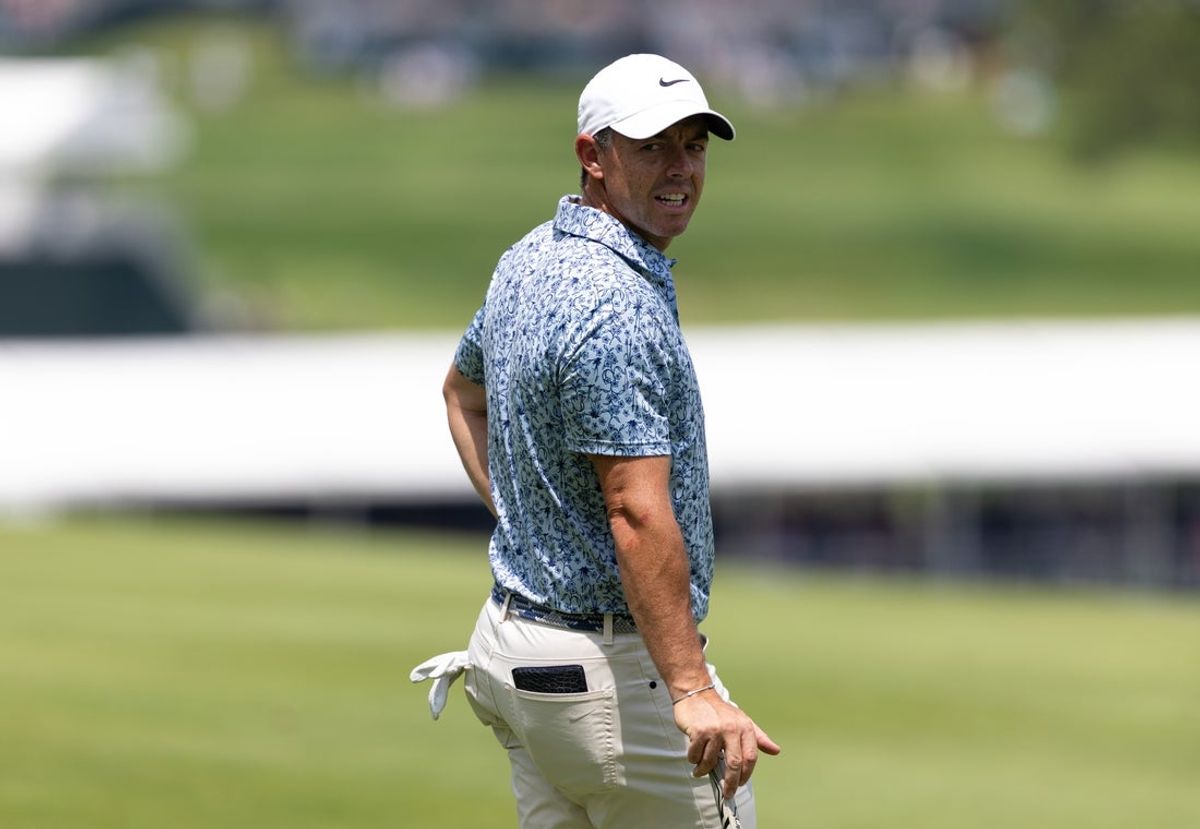 Jun 21, 2025; Cromwell, Connecticut, USA; Rory McIlroy looks on after playing his second shot on the second hole during the third round of the Travelers Championship golf tournament. Mandatory Credit: Bill Streicher-Imagn Images