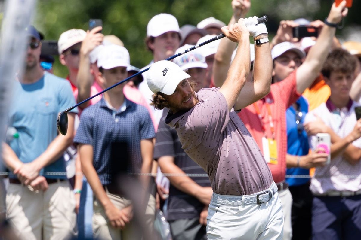 Jun 21, 2025; Cromwell, Connecticut, USA; Tommy Fleetwood plays his shot from the first tee during the third round of the Travelers Championship golf tournament. Mandatory Credit: Bill Streicher-Imagn Images