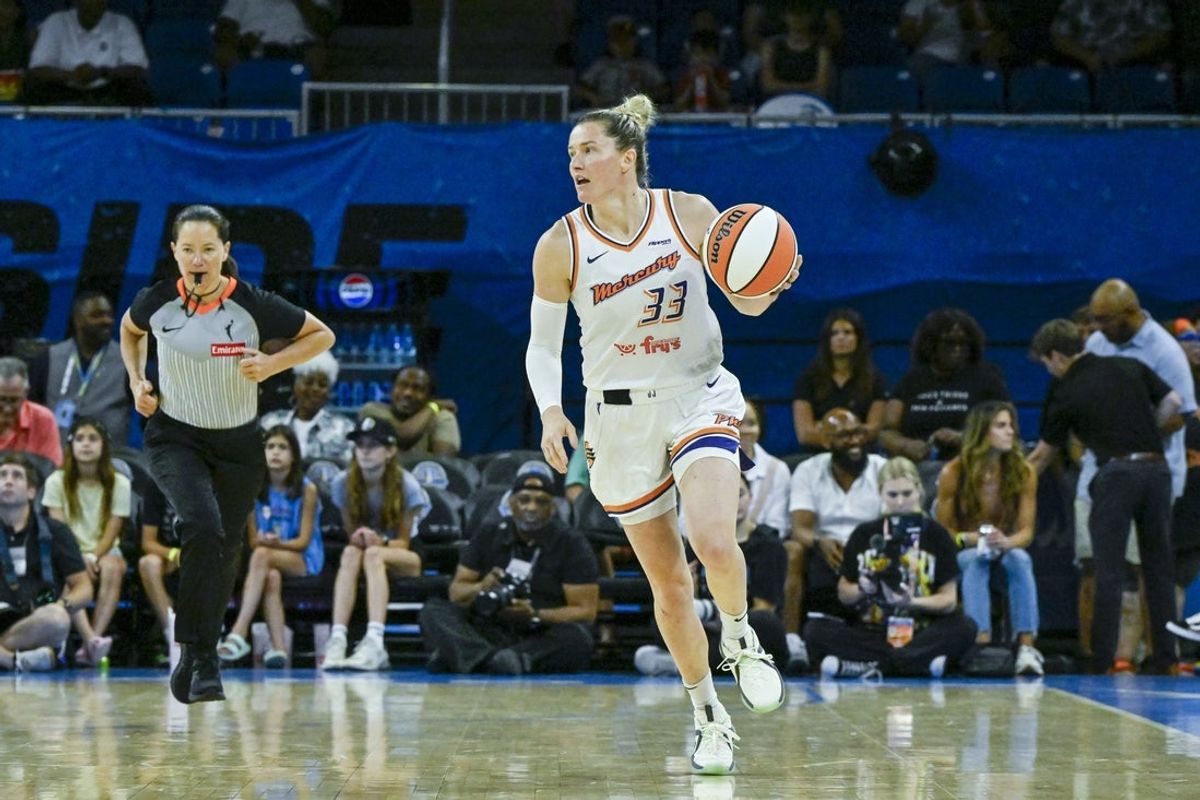 Jun 21, 2025; Chicago, Illinois, USA; Phoenix Mercury guard Sami Whitcomb (33) dribbles the ball against the Chicago Sky at Wintrust Arena. Mandatory Credit: Matt Marton-Imagn Images