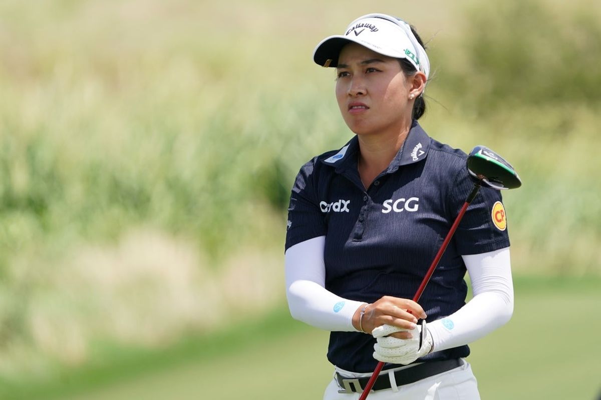 Jun 21, 2025; Frisco, Texas, USA; Jeeno Thitikul watches her shot from the second tee during the third round of the KPMG Women's PGA Championship. Mandatory Credit: Raymond Carlin III-Imagn Images