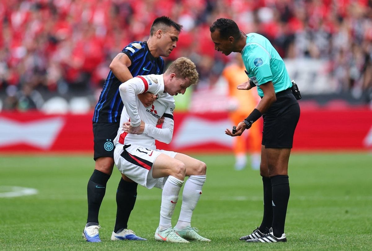 Jun 21, 2025; Seattle, Washington, USA; Inter Milan defender Lautaro Martinez (13) and Urawa Red Diamonds midfielder Samuel Gustafsson (11) as referee Beida Damane reacts  during a group stage match of the 2025 FIFA Club World Cup at Lumen Field. Mandatory Credit: Stephen Brashear-Imagn Images