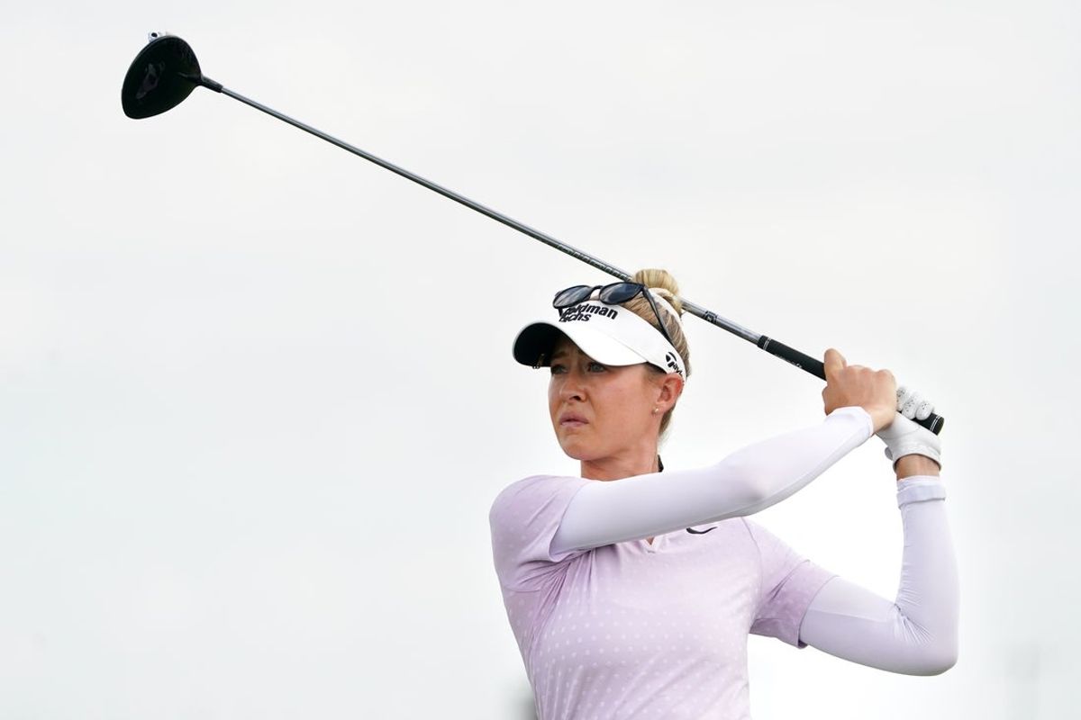 Jun 21, 2025; Frisco, Texas, USA; Nelly Korda watches her shot from the second tee during the third round of the KPMG Women's PGA Championship. Mandatory Credit: Raymond Carlin III-Imagn Images