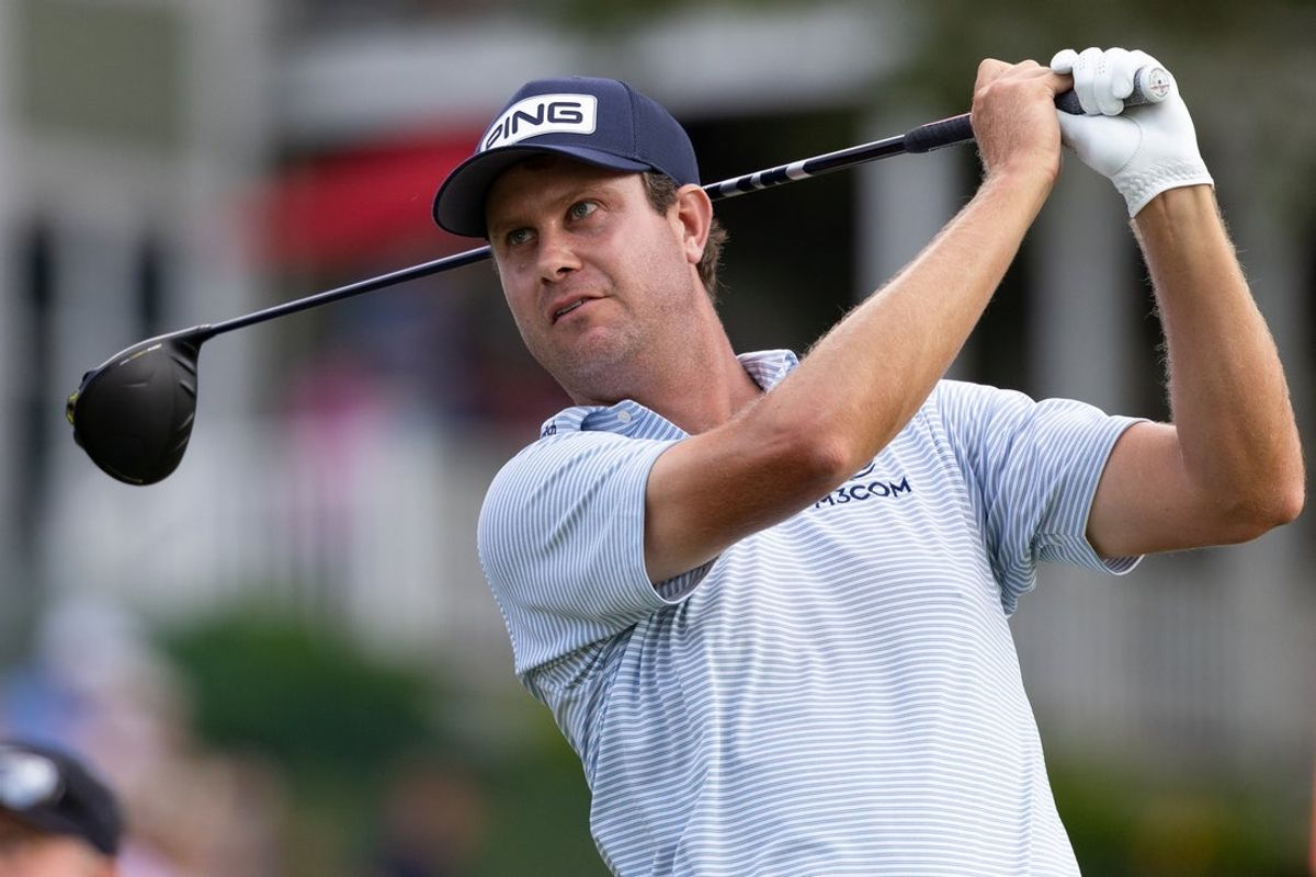 Jun 21, 2025; Cromwell, Connecticut, USA; Harris English plays his shot from the 18th tee during the third round of the Travelers Championship golf tournament. Mandatory Credit: Bill Streicher-Imagn Images