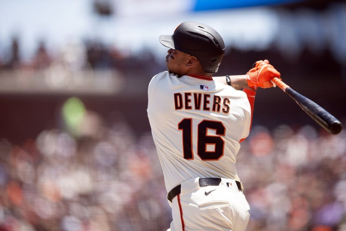 Jun 21, 2025; San Francisco, California, USA; San Francisco Giants designated hitter Rafael Devers (16) follows the flight of his two-run home run against the Boston Red Sox during the third inning at Oracle Park. Mandatory Credit: D. Ross Cameron-Imagn Images