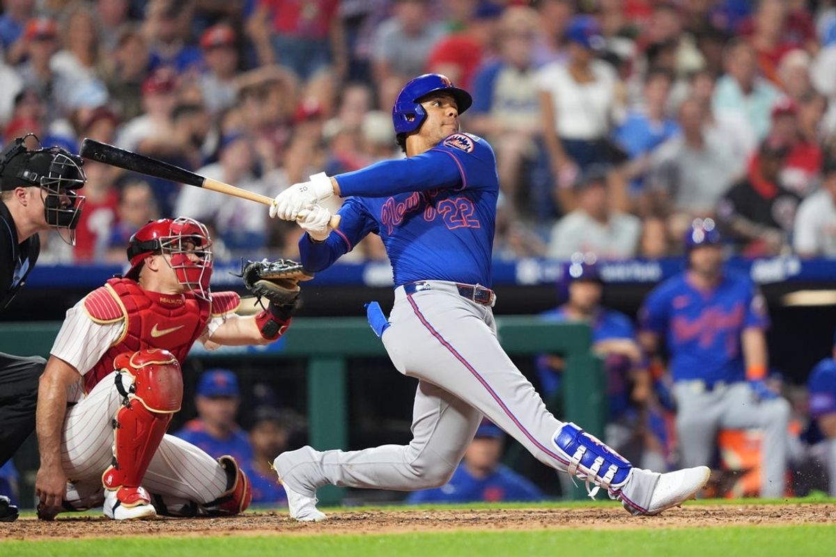 Jun 21, 2025; Philadelphia, Pennsylvania, USA; New York Mets outfielder Juan Soto (22) hits a home run against the Philadelphia Phillies in the fifth inning at Citizens Bank Park. Mandatory Credit: Kyle Ross-Imagn Images