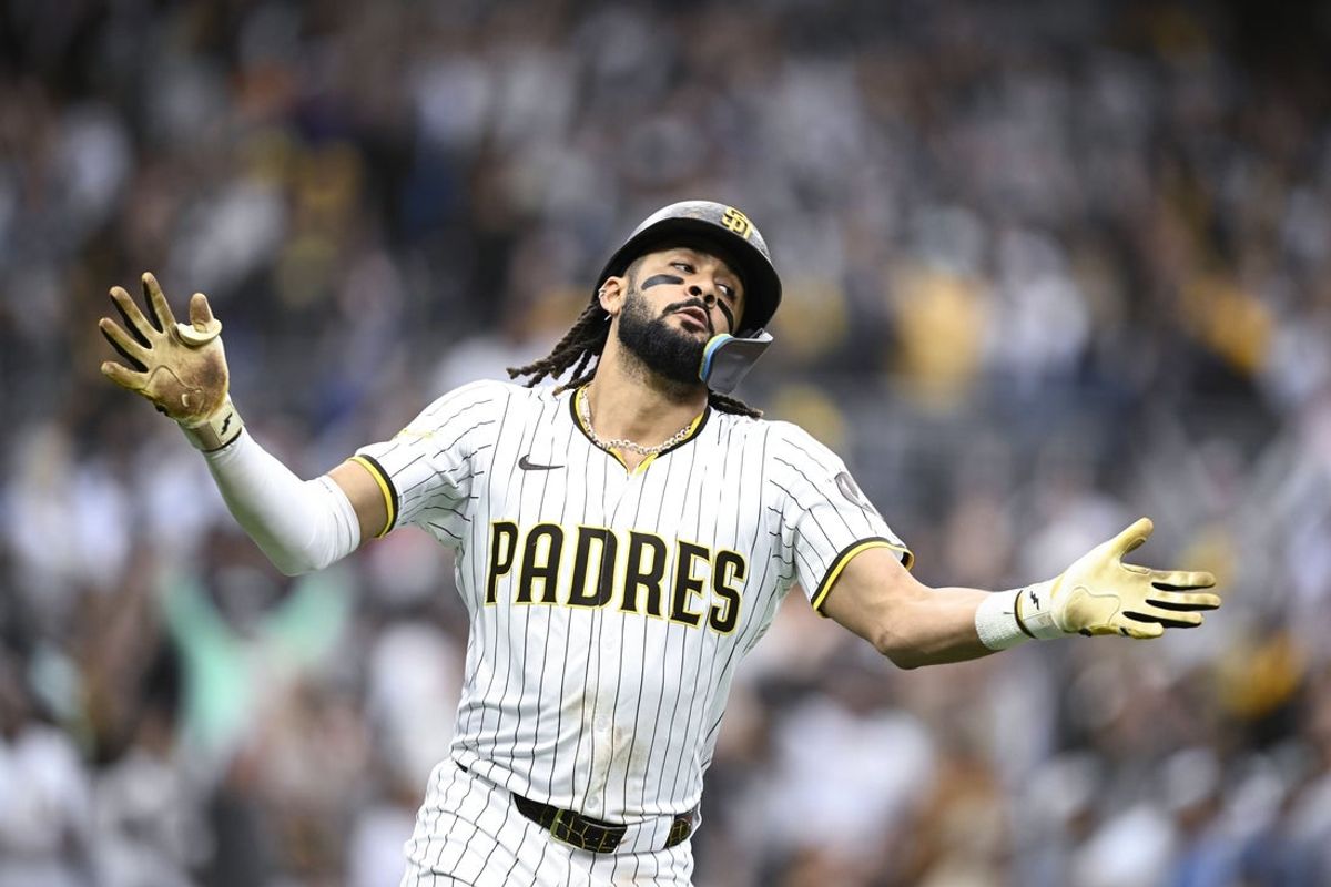 Jun 21, 2025; San Diego, California, USA; San Diego Padres right fielder Fernando Tatis Jr. (23) celebrates after hitting a three-run home run during the seventh inning against the Kansas City Royals at Petco Park. Mandatory Credit: Denis Poroy-Imagn Images