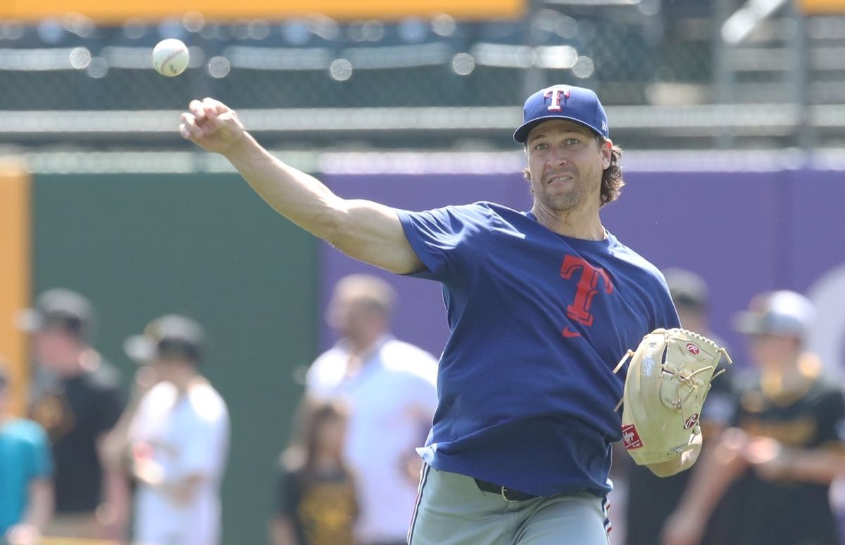 Jun 22, 2025; Pittsburgh, Pennsylvania, USA;  Texas Rangers pitcher Jacob deGrom (48) throws in the outfield before the game against the Pittsburgh Pirates at PNC Park. Mandatory Credit: Charles LeClaire-Imagn Images