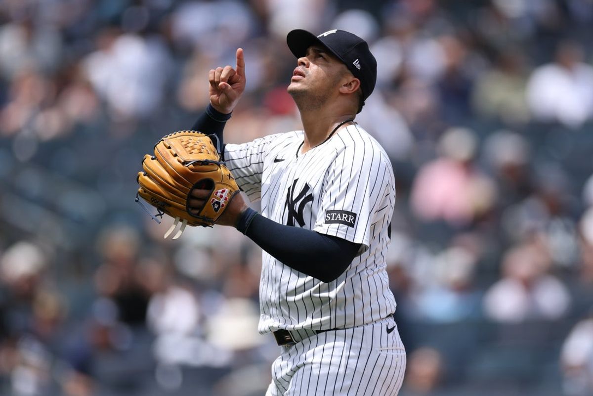 Jun 22, 2025; Bronx, New York, USA; New York Yankees relief pitcher Fernando Cruz (63) reacts after striking out the side during the eighth inning against the Baltimore Orioles at Yankee Stadium. Mandatory Credit: Vincent Carchietta-Imagn Images