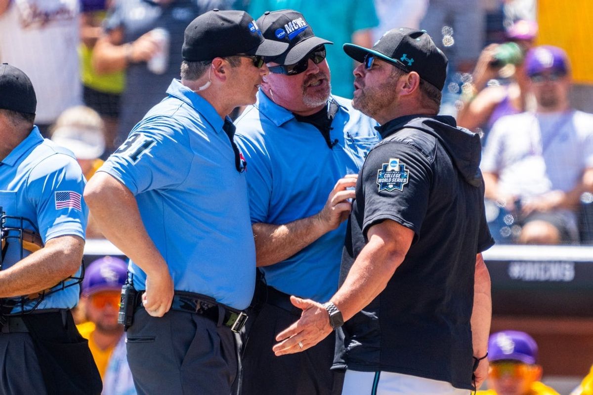 Jun 22, 2025; Omaha, Neb, USA; Coastal Carolina Chanticleers head coach Kevin Schnall reacts after being ejected during the first inning against the LSU Tigers at Charles Schwab Field. Mandatory Credit: Dylan Widger-Imagn Images