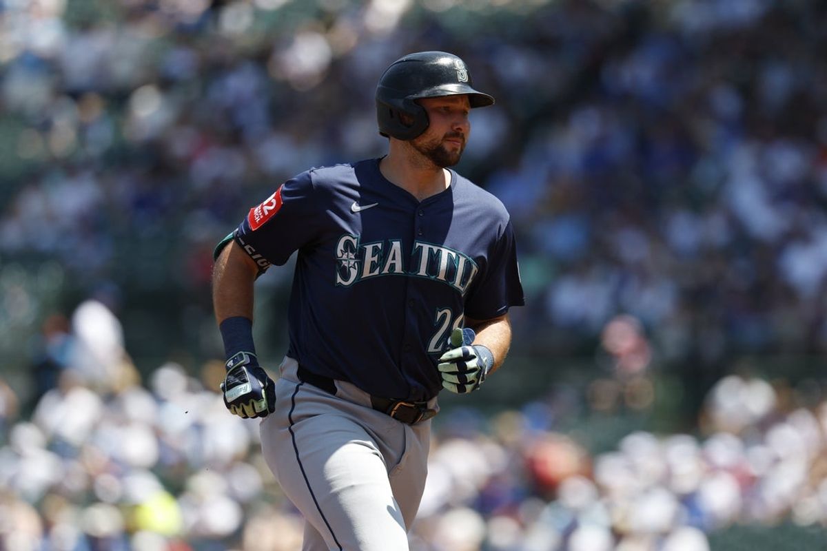 Jun 22, 2025; Chicago, Illinois, USA; Seattle Mariners designated hitter Cal Raleigh (29) rounds the bases after hitting a two-run home run against the Chicago Cubs during the first inning at Wrigley Field. Mandatory Credit: Kamil Krzaczynski-Imagn Images