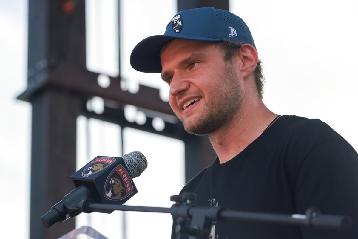 Jun 22, 2025; Fort Lauderdale, Florida, UNITED STATES; Florida Panthers center Aleksander Barkov (16) speaks to the fans during the Stanley Cup championship parade and rally. Mandatory Credit: Sam Navarro-Imagn Images