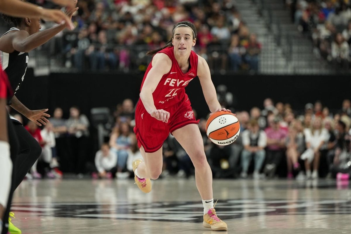 Jun 22, 2025; Las Vegas, Nevada, USA; Indiana Fever guard Caitlin Clark (22) dribbles the ball during the second half of a WNBA basketball game against the Las Vegas Aces at T-Mobile Arena. Mandatory Credit: Lucas Peltier-Imagn Images