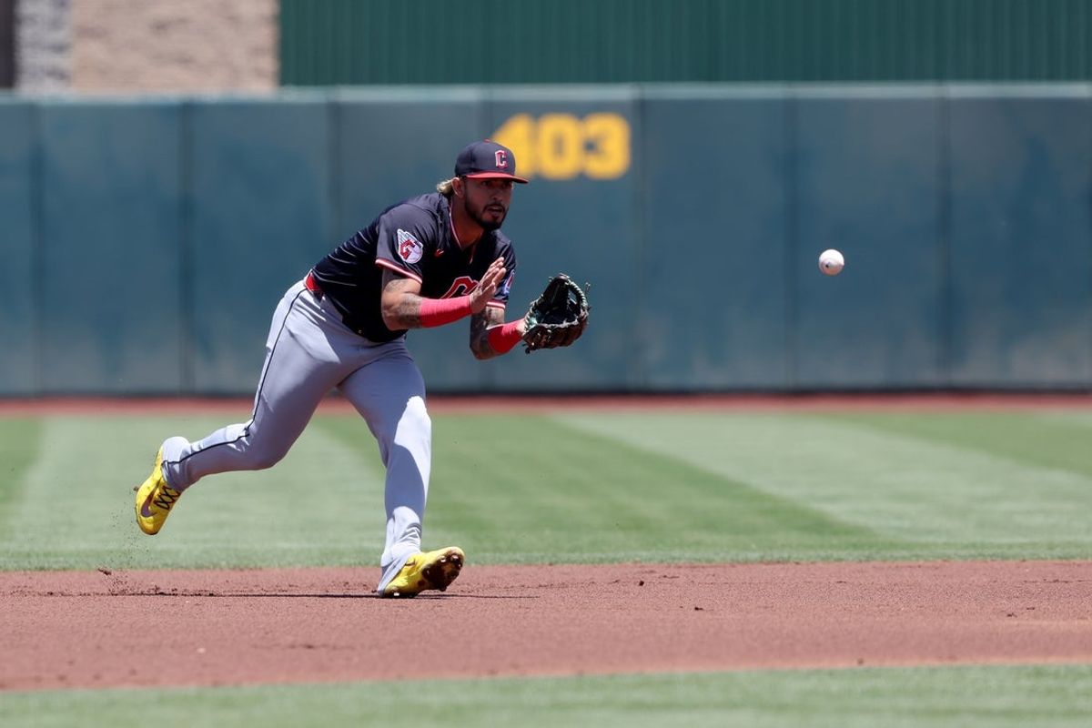 Jun 22, 2025; West Sacramento, California, USA; Cleveland Guardians shortstop Gabriel Arias (13) fields a ground ball against the Athletics during the first inning at Sutter Health Park. Mandatory Credit: Dennis Lee-Imagn Images