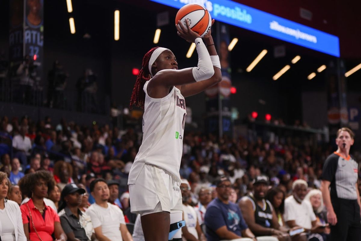 Jun 22, 2025; College Park, Georgia, USA; Atlanta Dream guard Rhyne Howard (10) shoots against the Chicago Sky in the fourth quarter at Gateway Center Arena at College Park. Mandatory Credit: Brett Davis-Imagn Images