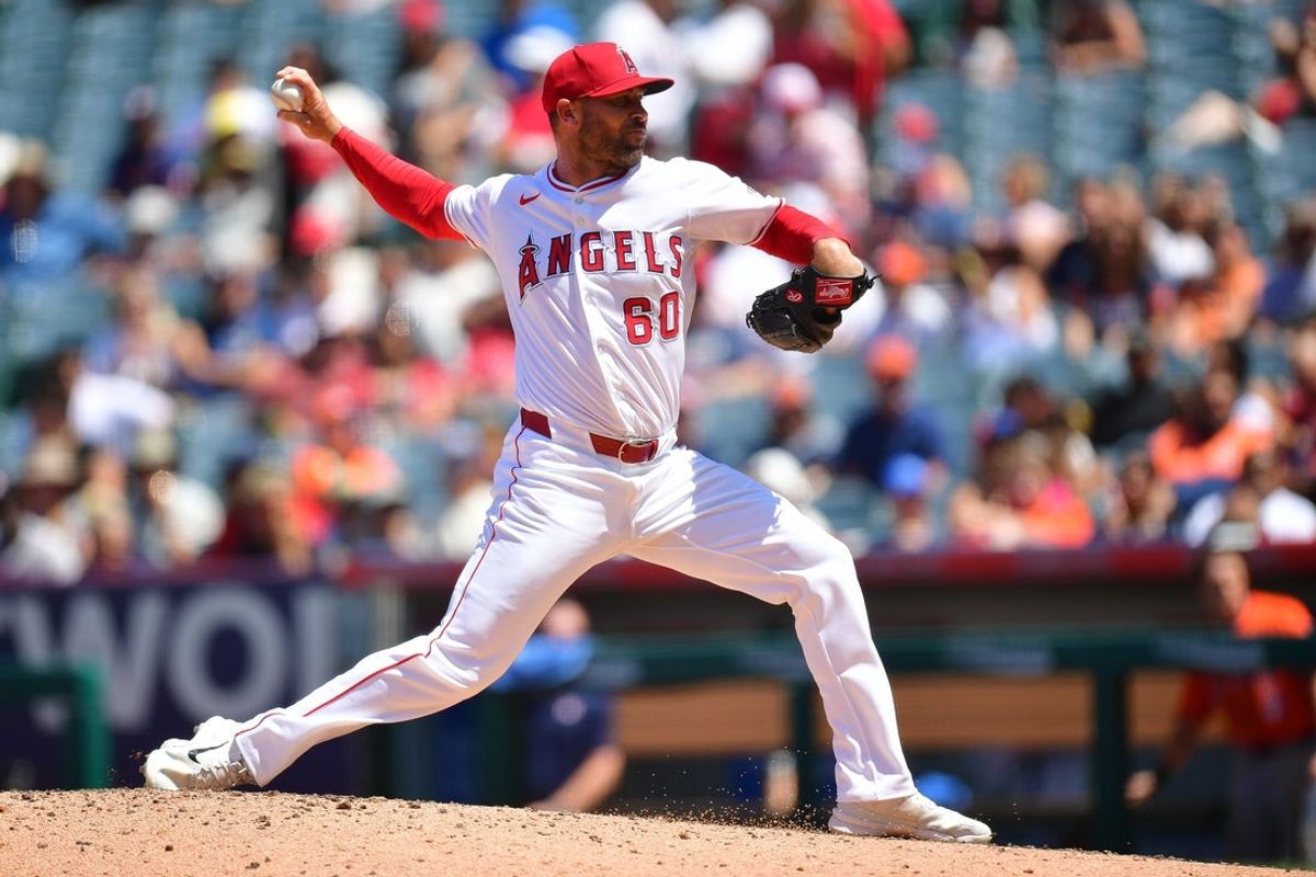 Jun 22, 2025; Anaheim, California, USA; Los Angeles Angels pitcher Hunter Strickland (60) throws against the Houston Astros during the sixth inning at Angel Stadium. Mandatory Credit: Gary A. Vasquez-Imagn Images