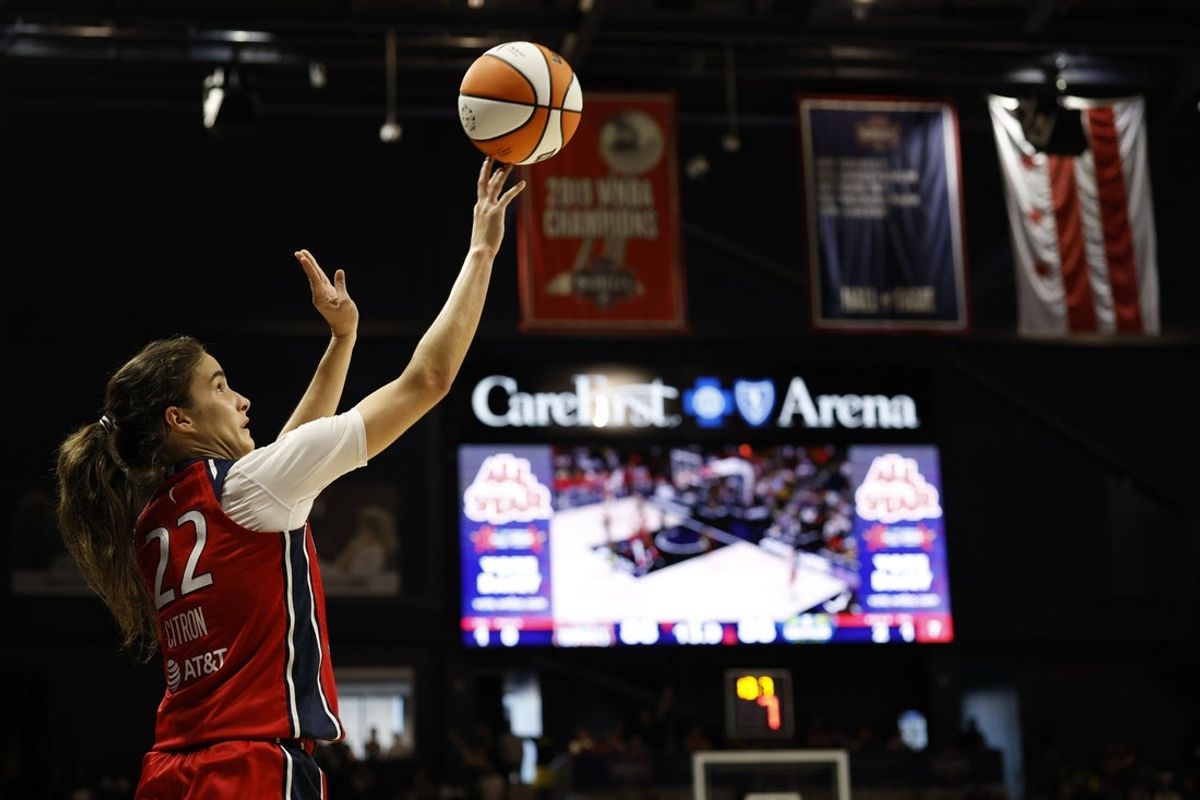 Jun 22, 2025; Washington, District of Columbia, USA; Washington Mystics guard Sonia Citron (22) makes a go-ahead three point field goal against the Dallas Wings in the final seconds of overtime at Entertainment & Sports Arena. Mandatory Credit: Geoff Burke-Imagn Images