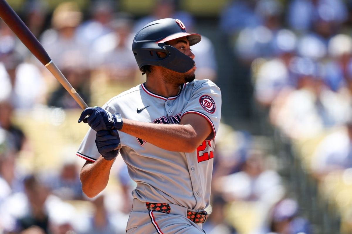 Jun 22, 2025; Los Angeles, California, USA;  Washington Nationals left fielder James Wood (29) hits a single during the fifth inning against the Los Angeles Dodgers at Dodger Stadium. Mandatory Credit: Kiyoshi Mio-Imagn Images