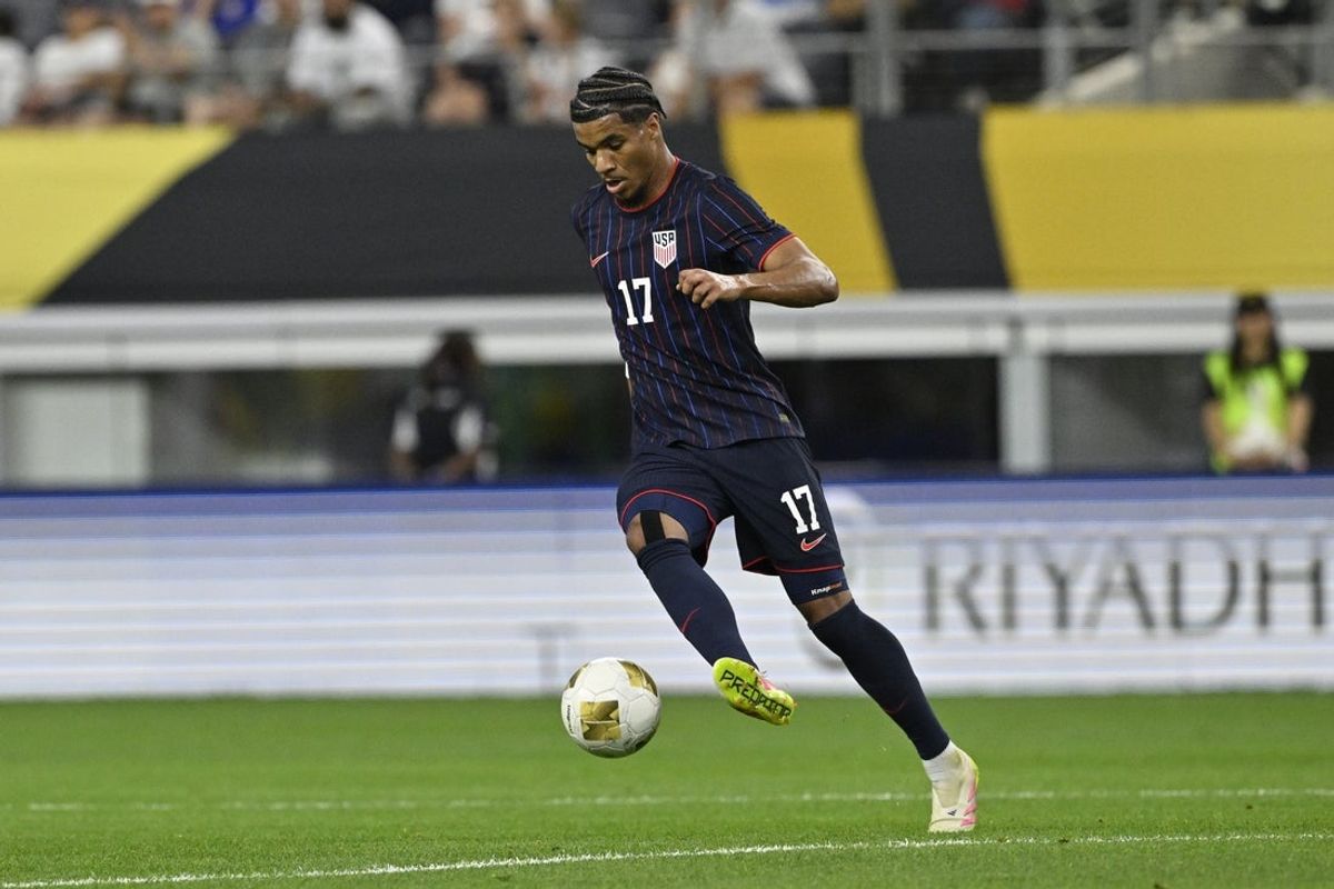 Jun 22, 2025; Arlington, Texas, USA; United States of America forward Malik Tillman (17) dribbles the ball during the second half against Haiti during a group stage match of the 2025 Gold Cup at AT&T Stadium. Mandatory Credit: Jerome Miron-Imagn Images