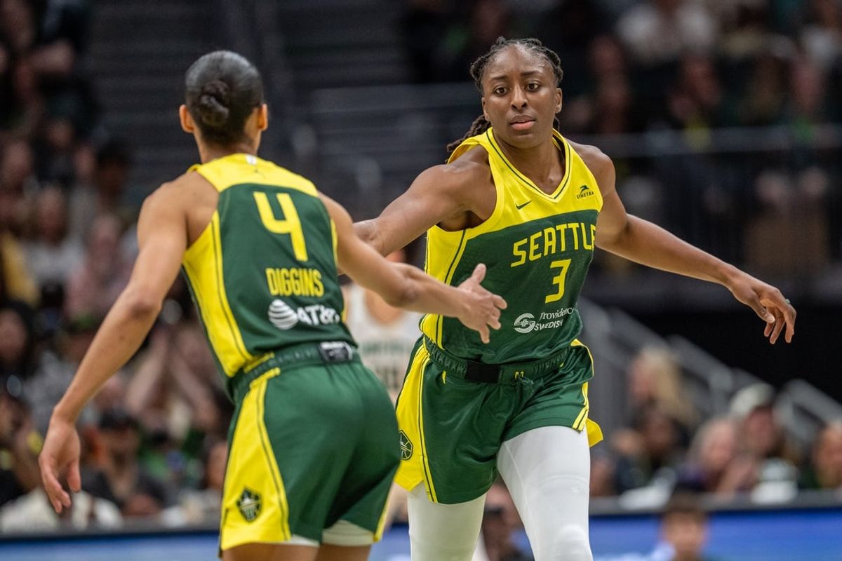 Jun 22, 2025; Seattle, Washington, USA;  Seattle Storm forward Nneka Ogwumike (3) and guard Skylar Diggins (4) celebrate during the second half against the New York Liberty at Climate Pledge Arena. Mandatory Credit: Stephen Brashear-Imagn Images