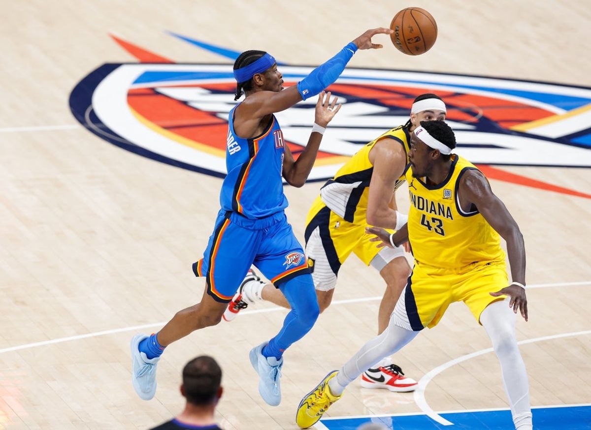 Jun 22, 2025; Oklahoma City, Oklahoma, USA; Oklahoma City Thunder guard Shai Gilgeous-Alexander (2) passes the ball while Indiana Pacers forward Pascal Siakam (43) defends during the first half of game seven of the 2025 NBA Finals at Paycom Center. Mandatory Credit: Alonzo Adams-Imagn Images