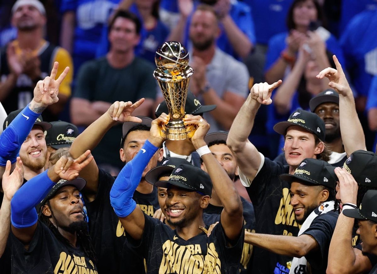 Jun 22, 2025; Oklahoma City, Oklahoma, USA; Oklahoma City Thunder guard Shai Gilgeous-Alexander (2) lifts the Larry O'Brien Championship Trophy as the Oklahoma City Thunder celebrate after winning game seven of the 2025 NBA Finals against the Indiana Pacers at Paycom Center. Mandatory Credit: Alonzo Adams-Imagn Images