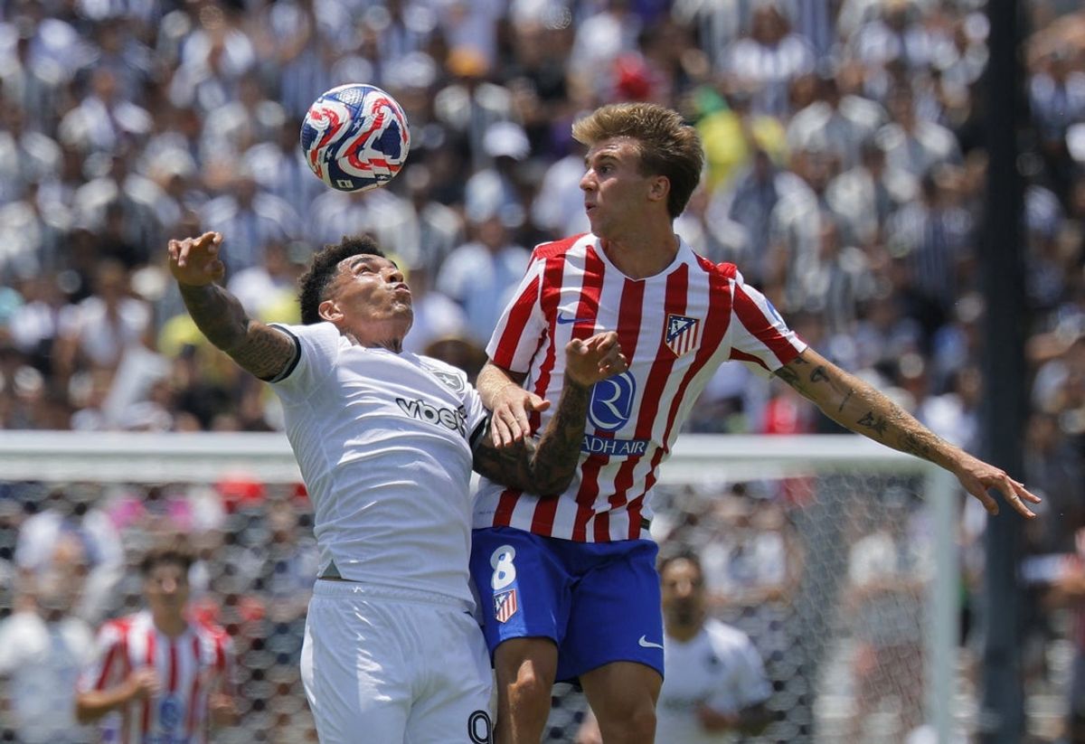 [Subscription Customers Only] Jun 23, 2025; Pasadena, California, USA; Atletico De Madrid midfielder Pablo Barrios (8) and Botafogo forward Rwan Cruz (9) jump for a header  during a group stage match of the 2025 FIFA Club World Cup at Rose Bowl Stadium. Mandatory Credit: Mike Blake-Reuters via Imagn Images