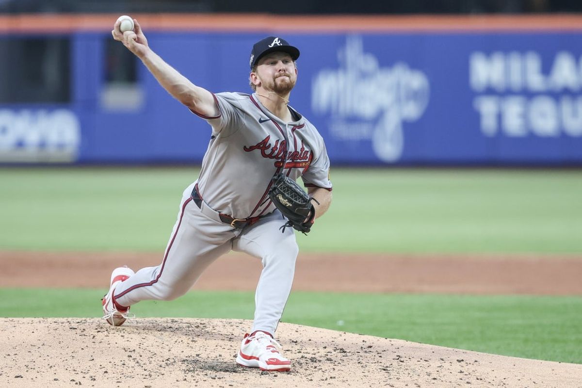 Jun 23, 2025; New York City, New York, USA;  Atlanta Braves starting pitcher Spencer Schwellenbach (56) pitches in the third inning New York Mets at Citi Field. Mandatory Credit: Wendell Cruz-Imagn Images