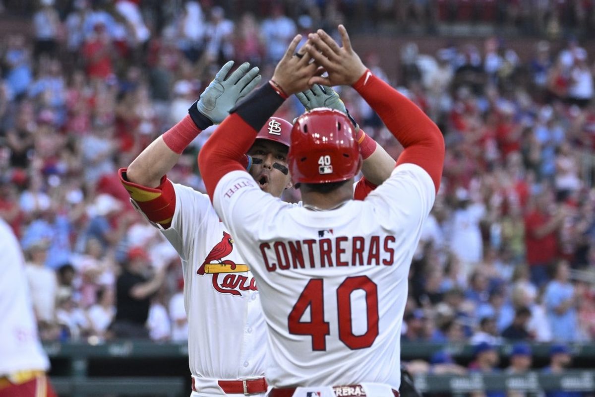 Jun 23, 2025; St. Louis, Missouri, USA; St. Louis Cardinals left fielder Lars Nootbaar (21) is congratulated by St. Louis Cardinals first baseman Willson Contreras (40) after hitting a two-run home run against the Chicago Cubs in the fourth inning at Busch Stadium. Mandatory Credit: Joe Puetz-Imagn Images