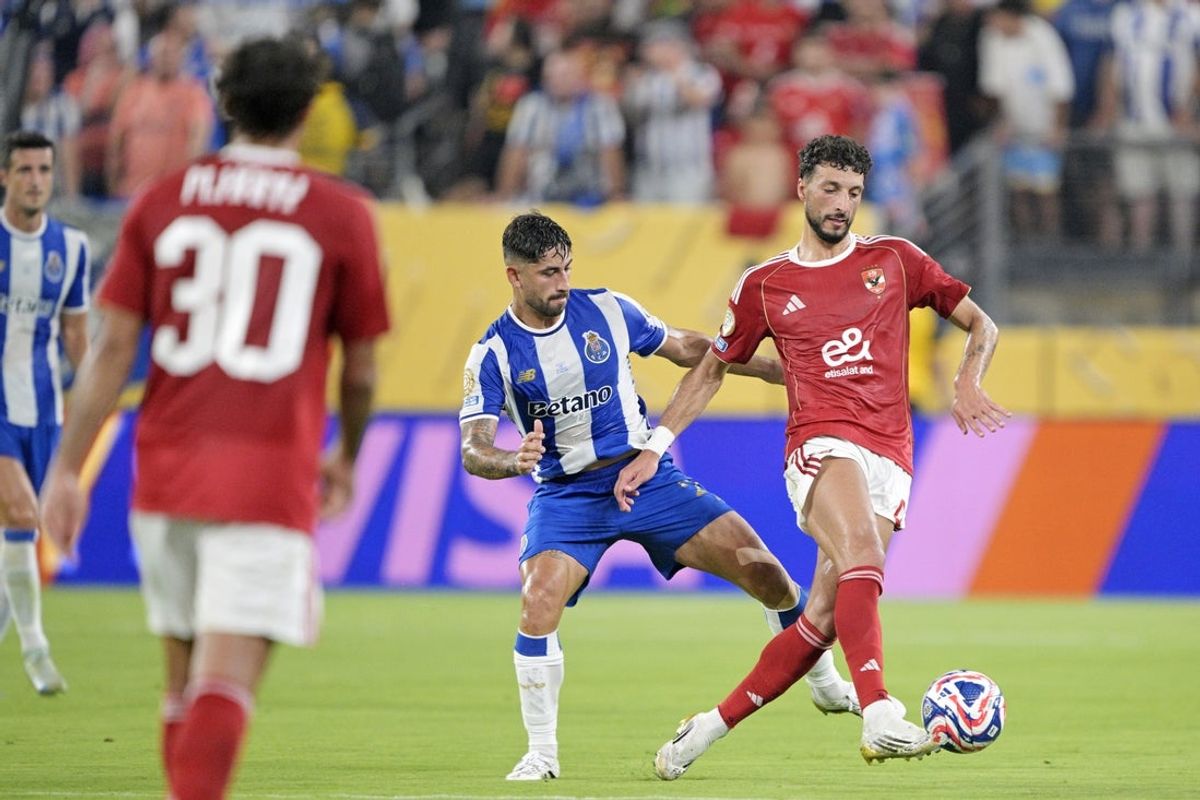 Jun 23, 2025; East Rutherford, New Jersey, USA; Al Ahly FC midfielder Hamdy Fathy (8) controls the ball as FC Porto midfielder Alan Varela (22) defends during the first half during a group stage match of the 2025 FIFA Club World Cup at MetLife Stadium. Mandatory Credit: Mark Smith-Imagn Images