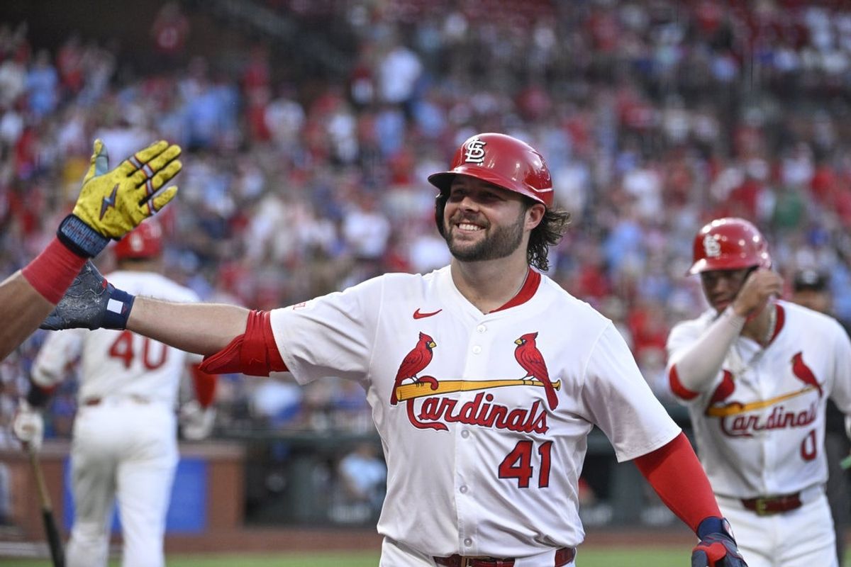 Jun 23, 2025; St. Louis, Missouri, USA; St. Louis Cardinals right fielder Alec Burleson (41) is congratulated after hitting a two-run home run against the Chicago Cubs in the fifth inning at Busch Stadium. Mandatory Credit: Joe Puetz-Imagn Images