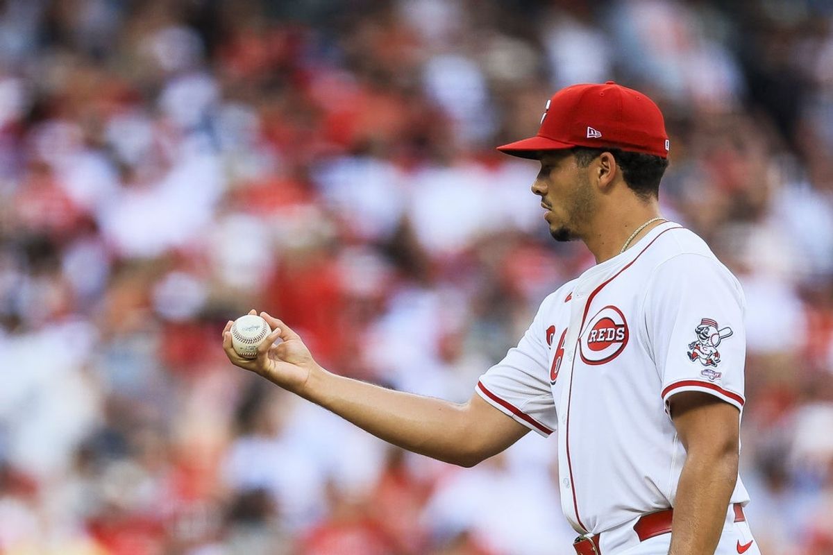Jun 24, 2025; Cincinnati, Ohio, USA; Cincinnati Reds starting pitcher Chase Burns (26) prepares to pitch in the third inning against the New York Yankees at Great American Ball Park. Mandatory Credit: Katie Stratman-Imagn Images