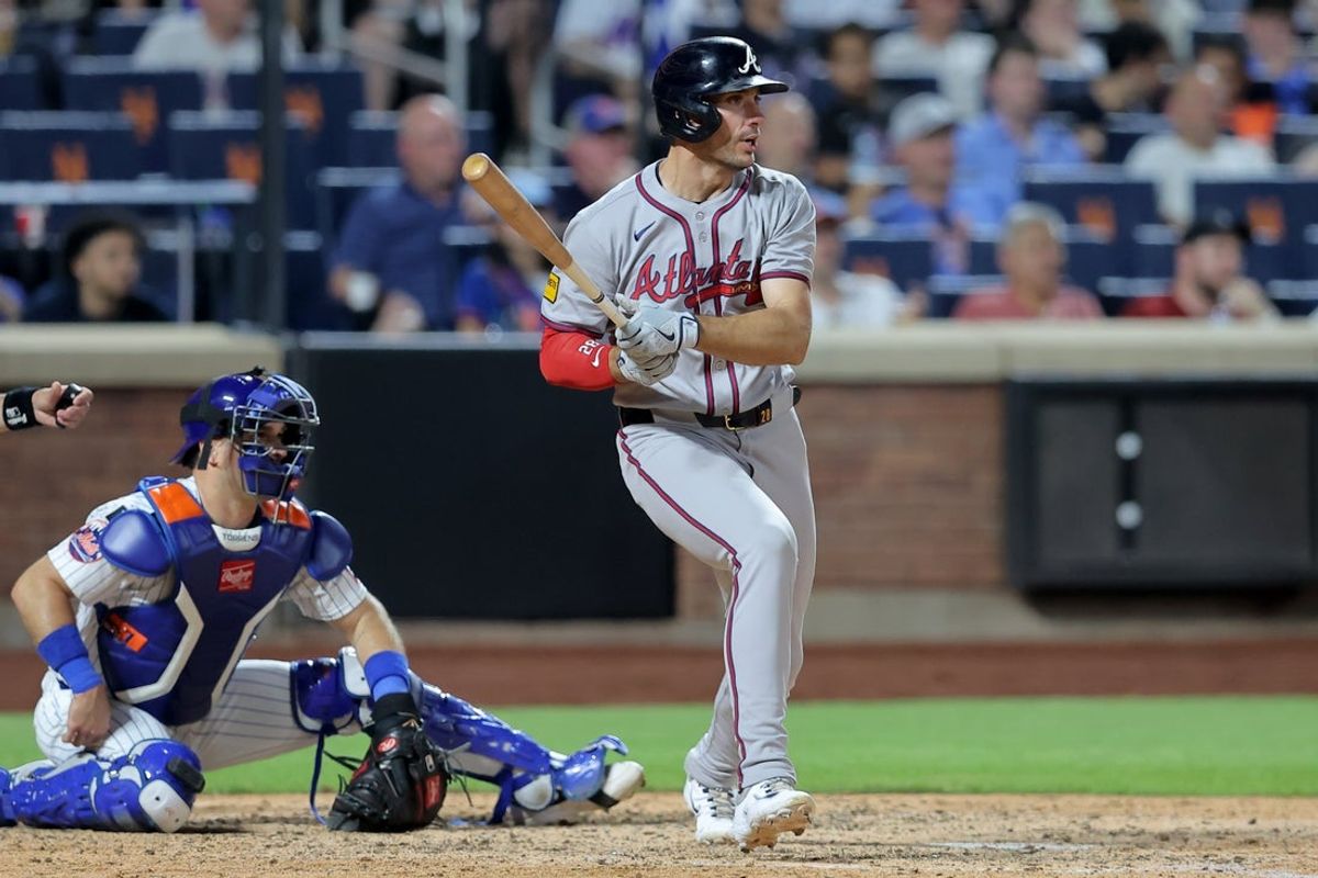 Jun 24, 2025; New York City, New York, USA; Atlanta Braves first baseman Matt Olson (28) follows through on a two run single against the New York Mets during the sixth inning at Citi Field. Mandatory Credit: Brad Penner-Imagn Images