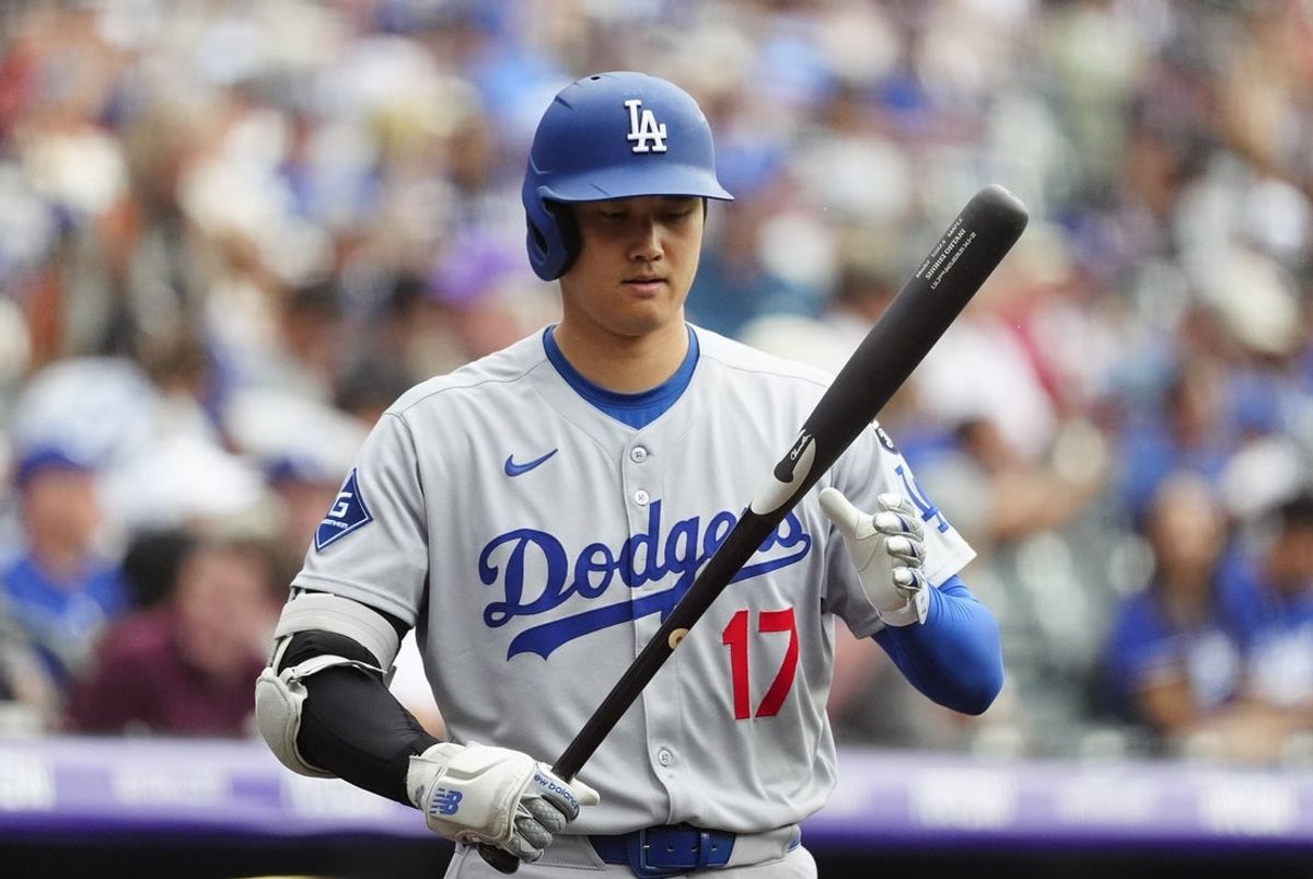 Jun 24, 2025; Denver, Colorado, USA; Los Angeles Dodgers designated hitter Shohei Ohtani (17) during the first inning against the Colorado Rockies at Coors Field. Mandatory Credit: Ron Chenoy-Imagn Images